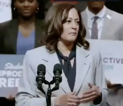 Vice\
 President Harris at the microphone
